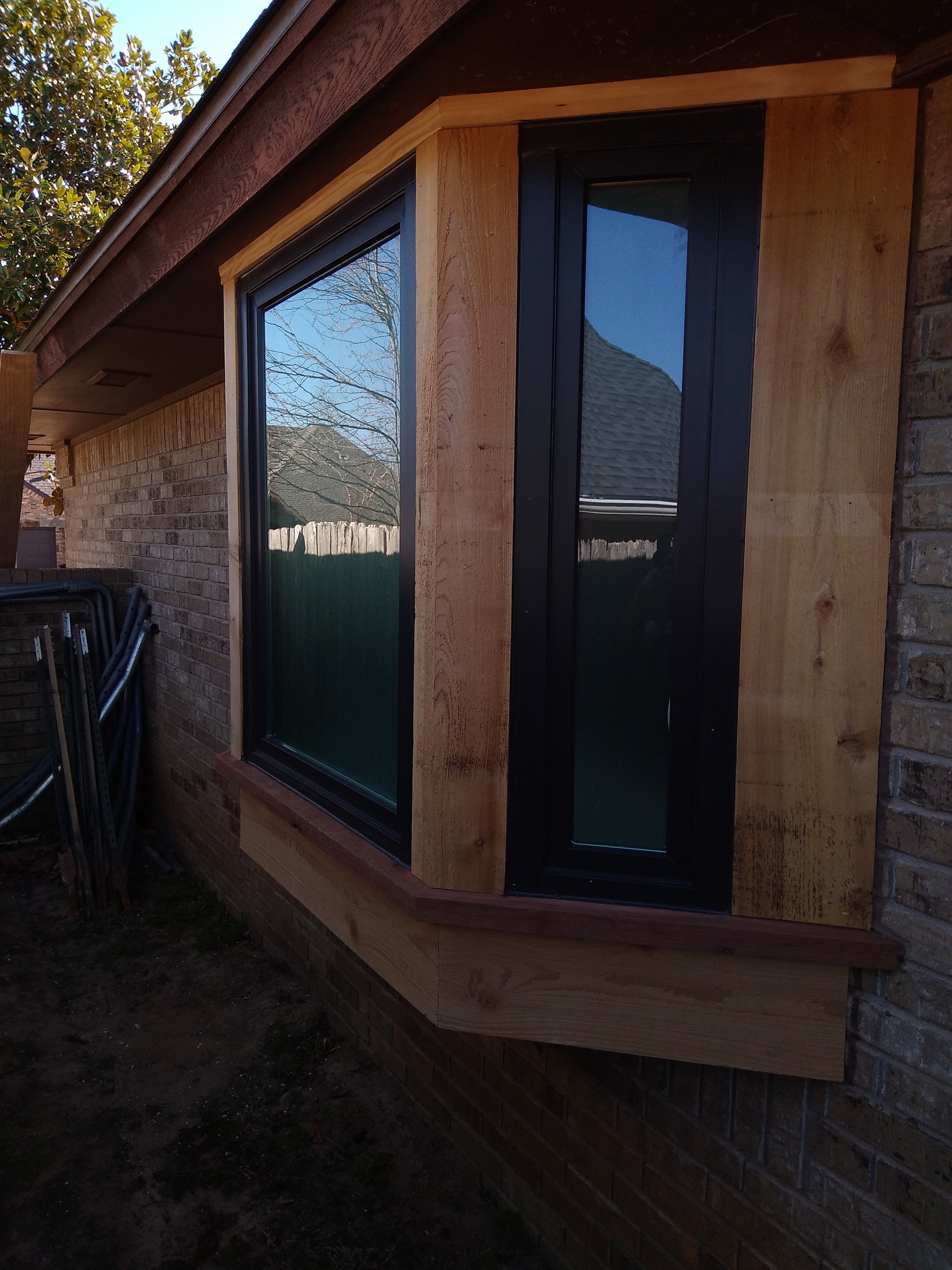 Cedar-Trim Bay Window Installation — view 1